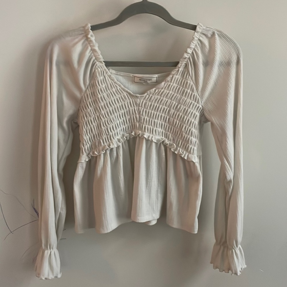Size small , long sleeve white shirt , soft material, perfect condition